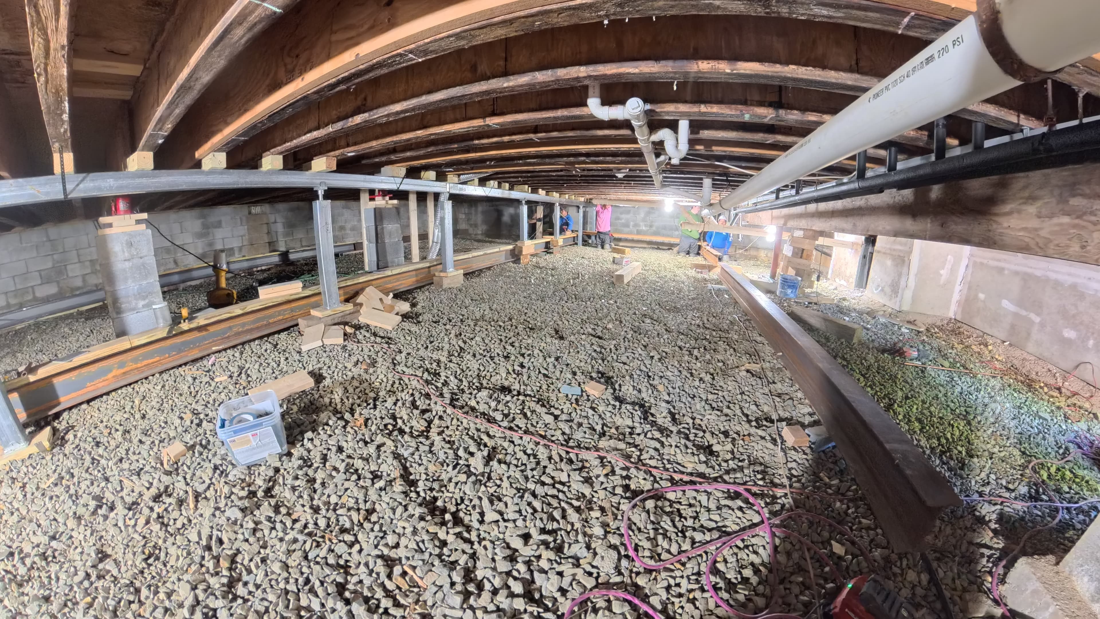 Full run of steel I-beam supports installed under the camp infirmary floor in Barryville, NY