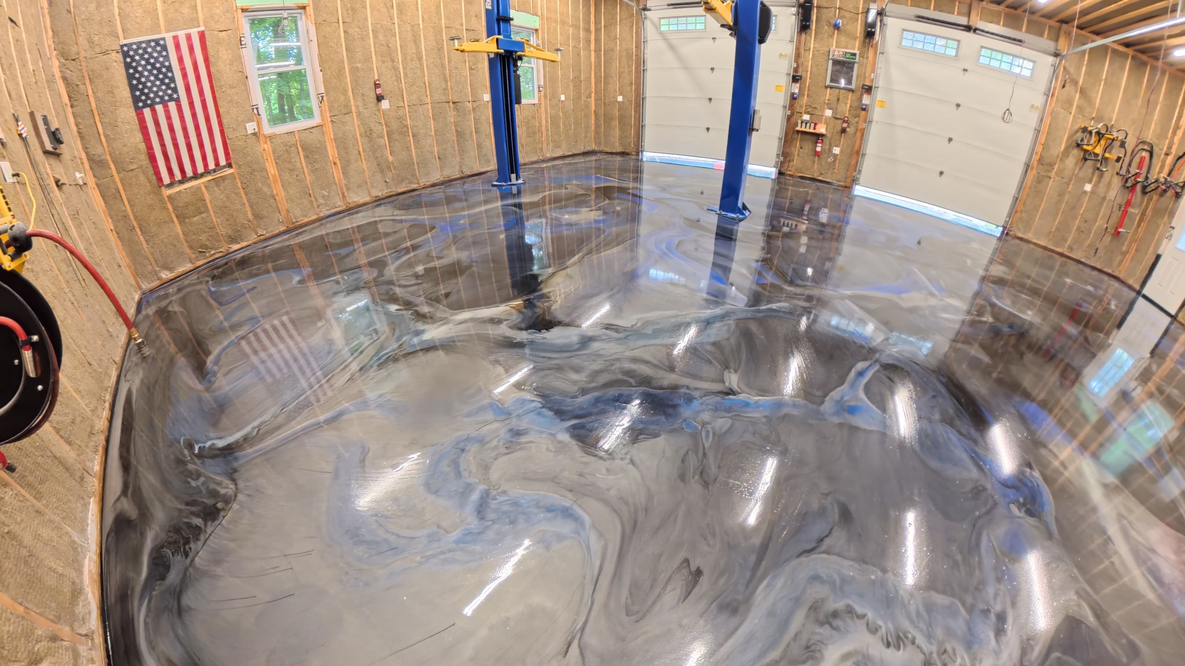 Slip-resistant, high-durability epoxy floor in a Kerhonkson, NY mechanic's shop